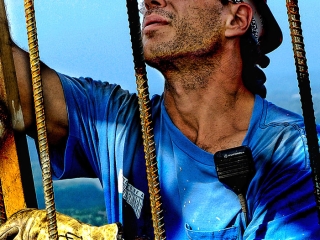 headshot of hard hat worker construction site